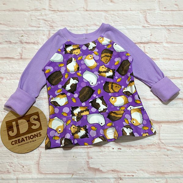 Size Small (12m-3y) Peplum - Purple Pigs